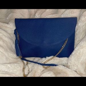 Mud Pie blue cross body clutch with gold chain and tassel